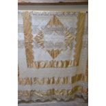 An early 20th century coffee silk and tatted bedcover with scalloped edge, 224 x 156 cm,