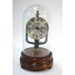 A Pinchin Johnson Bulle clock with 800 day electric movement, on mahogany plinth with glass dome,