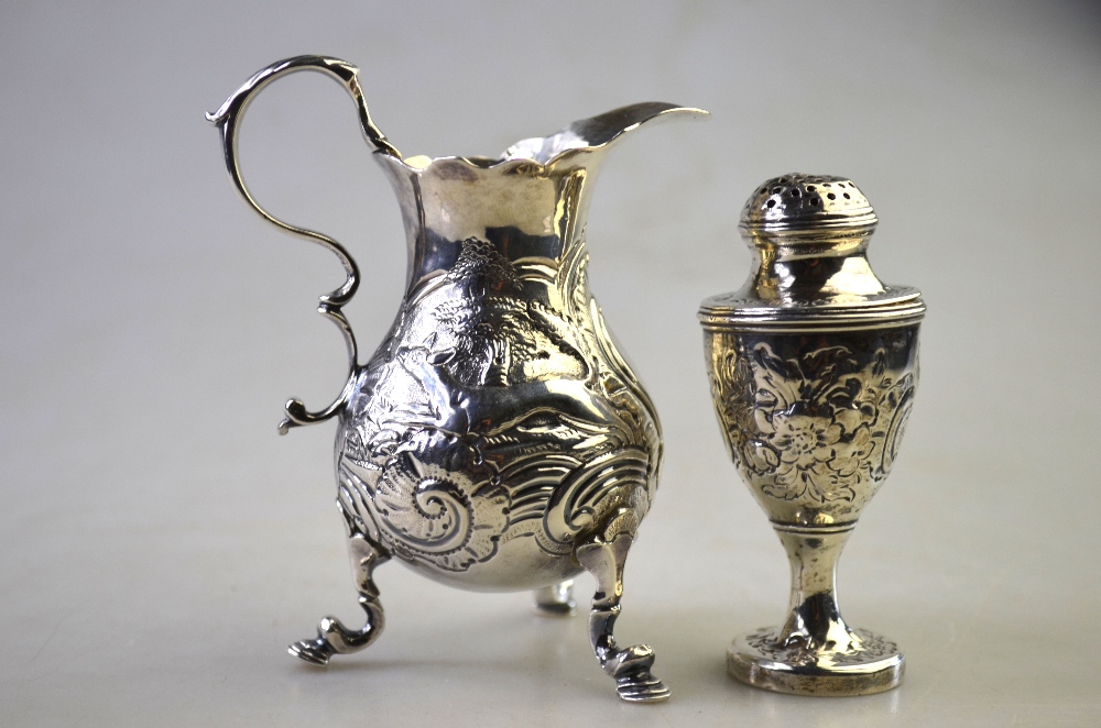 A George III silver pear-shaped cream jug with scroll handle and hoof feet, London 1749, - Image 3 of 7