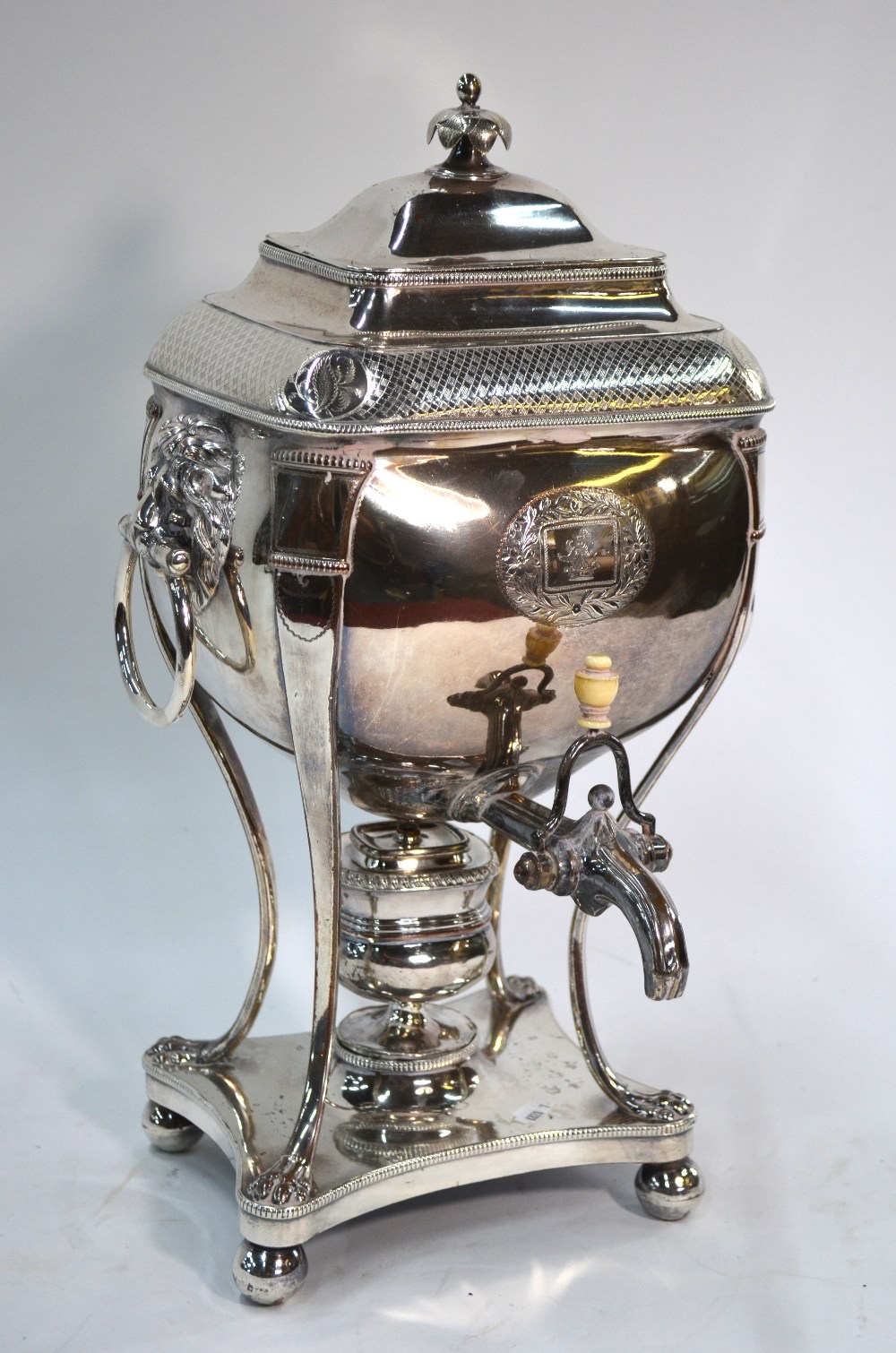 A Regency Old Sheffield Plate tea urn and cover with lion-mask and ring handles,