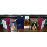 Three Bells Scotch Whisky Wade decanters, un-opened with contents,