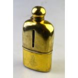 A Victorian silver gilt-clad hip flask with bayonet bun cover and detachable beaker,