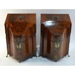 A pair of George III figured mahogany silver mounted knife boxes of serpentine form,