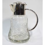 A heavy cut glass cocktail jug of waiste