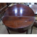 A Victorian mahogany demi-lune fold over