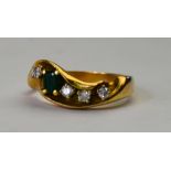 An emerald and diamond five stone ring,