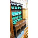 An 18th century oak high dresser, the pl