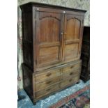 An 18th century oak livery cupboard in t