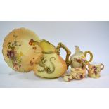 Four items of Royal Worcester blush ground wares decorated with flowers and foliage comprising;