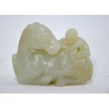 A green jade of pale or whitish hue, carved as a monkey seated on the back of a recumbent horse, 7.