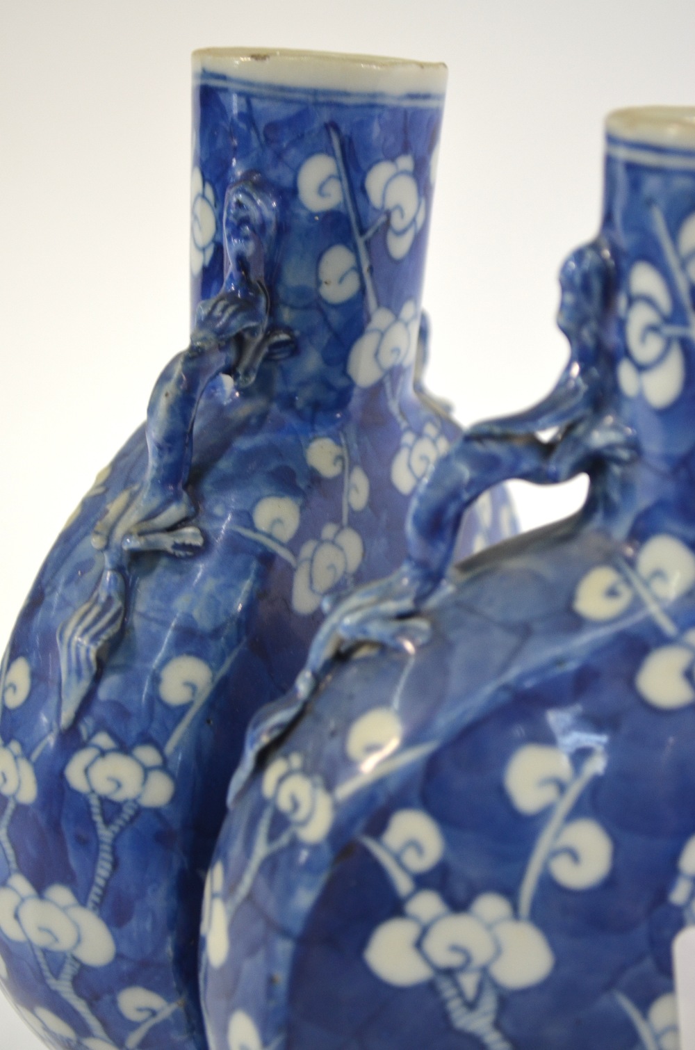 A pair of blue and white pilgrim flasks, each one decorated with a design of prunus in flower; 21. - Image 3 of 5