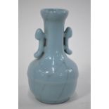 A small clair-de-lune (yueh pai style) vase with trumpet neck and pierced handles; 13cm high,