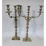 A large pair of three-sconce candelabra of baluster form with detachable scrolling twin branches,