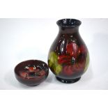 A Moorcroft flambe small ovoid vase decorated in the hibiscus pattern, 14 cm,