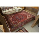 A Persian Heriz rug,