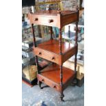 A Victorian mahogany three-tier stand / dumbwaiter with three drawers,