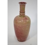 A mottled peachbloom/lang yao style oviform vase with trumpet neck; 20cm high,