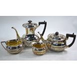 A late Victorian heavy quality silver half-reeded three-piece tea service with gadrooned rims,