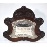 An historical, hardwood mounted, white metal memorial plaque presented to the Famous Aviatrix,