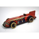 A Wells Brimtoy clockwork tinplate racing car in red,