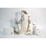 Five Lladro models - Tall lady with umbrella, 34 cm high; Girl with two geese, 27.