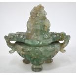 A Chinese green quartz/fluorite incense burner of tripod form with domed cover and mythological