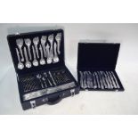 A set of modern design stainless steel and parcel gilt flatware and cutlery for twelve in two
