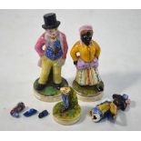 Three early 20th century Stevenson & Hancock figures of African Sall, puce painted mark, 9.