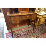 A small mahogany bowfront sideboard with three drawers,