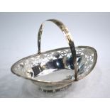 A George III Adam-style pierced silver navette sweetmeat basket with swing handle,