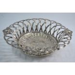 A late Victorian silver openwork fruit basket in the Georgian taste,