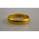 A 22ct yellow gold wedding band, size M 1/2,