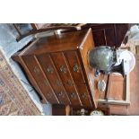 An 18th century oak chest of two short over three long graduated drawers,