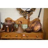 A heavy copper cauldron kettle with brass tap and iron swing handle to/w a copper conical