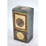 A Troika rectangular vase, rough textured green ground with incised geometric decoration,