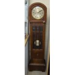 A 1920s German oak shortcase clock,