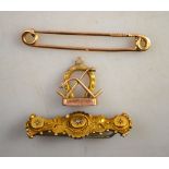A Victorian 9ct bar brooch set with three rose diamonds together with a 9ct safety pin and yellow
