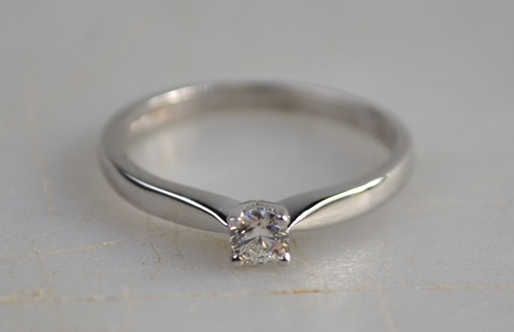 A single stone brilliant cut diamond ring 18ct white gold four claw setting,