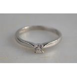 A single stone brilliant cut diamond ring 18ct white gold four claw setting,
