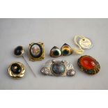 An interesting collection of jewellery items including pair of operculum earrings stamped sterling,