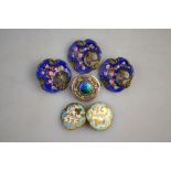 A circular Arts and Crafts brooch with blue/green enamel centre to/w three gilt metal enamelled
