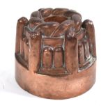 A Victorian copper jelly mould, stamped 247C,