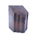 A George III mahogany knife box, the hinged slope top enclosing a fitted interior,