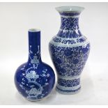 A blue and white vase decorated with prunus; the base with underglaze blue four-character mark,