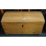 An early 19th century pine domed blanket box 96 cm wide