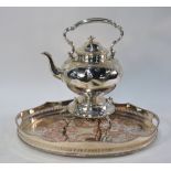 A Victorian electroplated kettle on stand with engraved decoration,