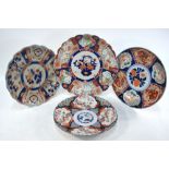 Four Imari dishes,