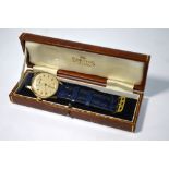 A gentleman's 9ct gold Smiths De Luxe wristwatch with 15 jewel movement,