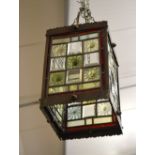 A metal framed ceiling lantern shade with leaded glass panels,