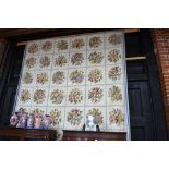 A large Aubusson style carpet, worked with field panels of floral sprays on a cream ground,